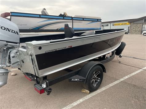 This 87" beam model includes Minnkota 55 PD, Hummingbird Helix 5, travel cover & third swivel seat. . Alumacraft 175 competitor tiller for sale